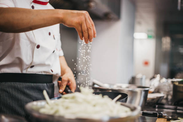 istock Chef preparing food in Asian restaurant 1154801168