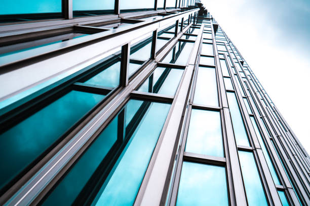 istock Architecture details Modern Building Glass facade Business background 1154801322