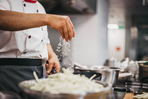 istock Chef preparing food in Asian restaurant 1154801728