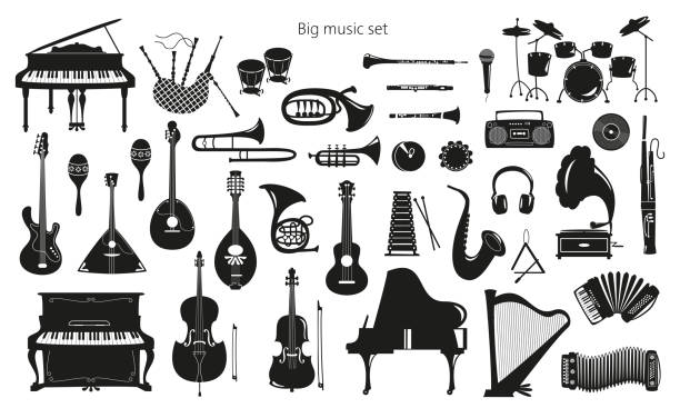 Set of musical instruments on the white background. Set of musical instruments on the white background. Vector illustration. rattle drum stock illustrations