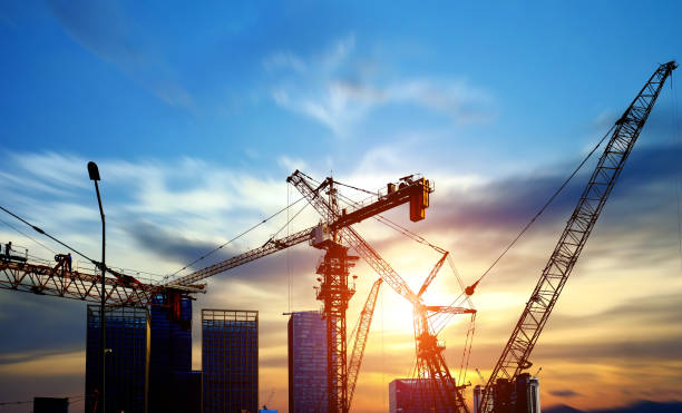 istock Tower cranes and skyscrapers on a construction site in shenzhen, China 1154803348