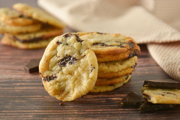 istock Homemade chocolate cookies on wooden table. 1154804483