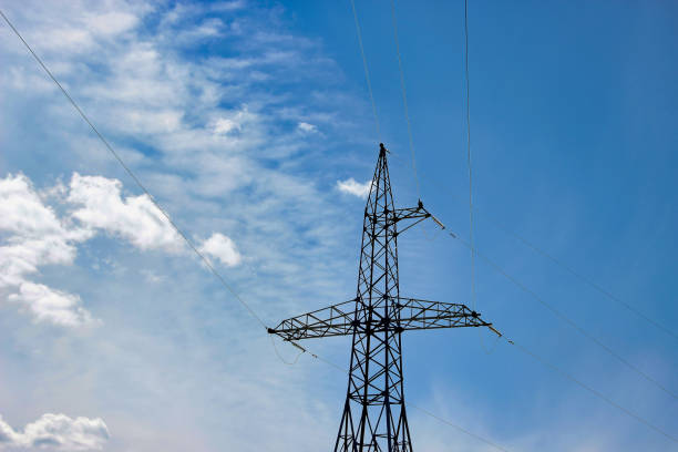 istock Power line tower on a background of the sky close-up. 1154809769