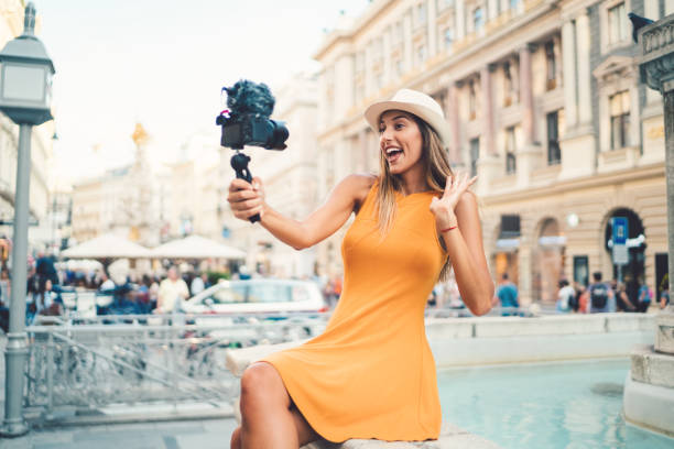 istock Attractive woman vlogging from Vienna 1154810538