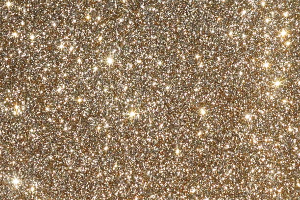 istock blur glitter or bokeh gold festive background,  texture. Xmas abstract background with copy space. 1154811627