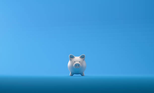 banco piggy sobre o fundo azul - iou - fotografias e filmes do acervo