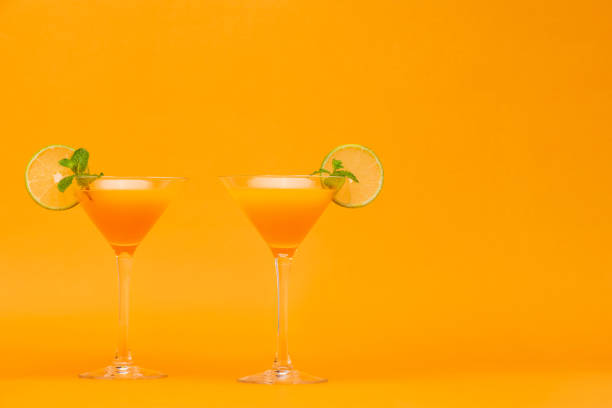 Refreshing orange juice cocktail drinks in the glasses