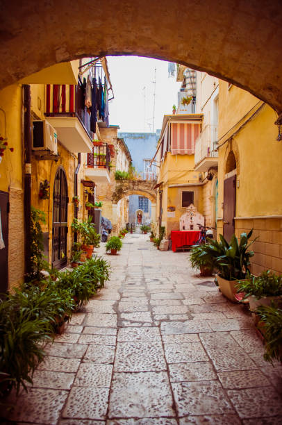 istock Spectacular view on the passage between the buildings in Italy 1154818951