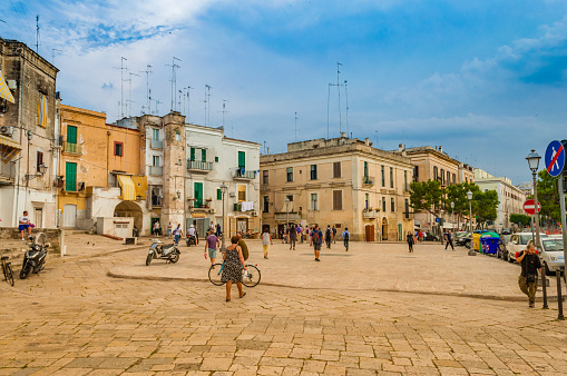 Bari, Italy - May 30 - local people walking on the central square in summer