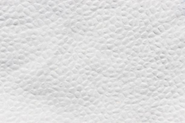 istock Texture background of white napkin. Wrinkled surface and pimple structure and design. 1154819179