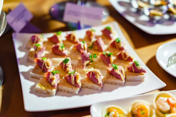 istock Beef Smoke on Bread with Vinaigrette on White Plate Cocktail Canapes. 1154819923