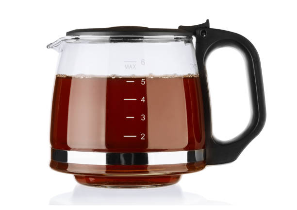 istock Glass teapot with tea isolated on white 1154819962