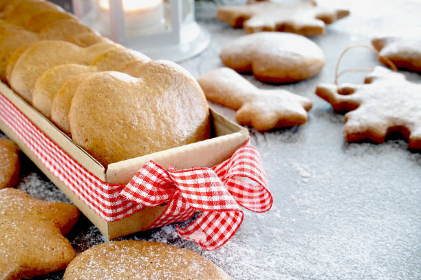 istock Christmas cookies on wooden background 1154820367