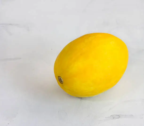 A Whole Honeydew Melon / Honey Melon / Yellow Melon on White Background Photography