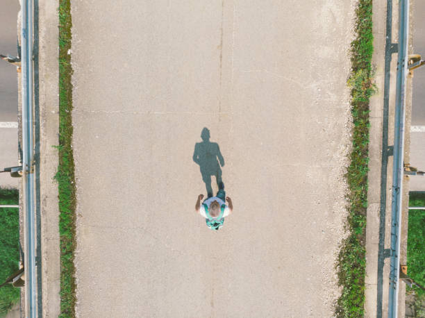 istock Road trip hike on asphalt roads 1154823841