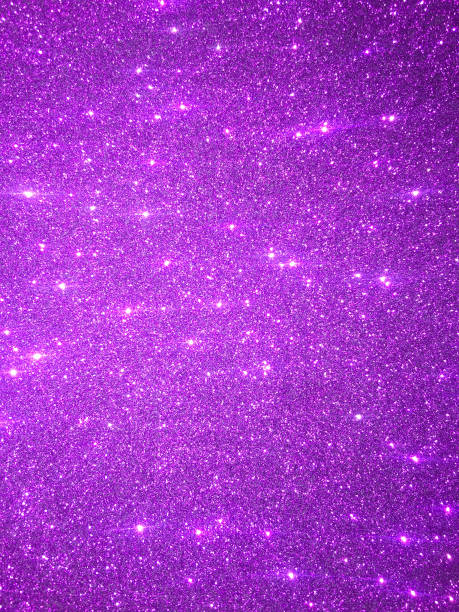 istock Purple glitter texture and shiny sparkle 1154825443