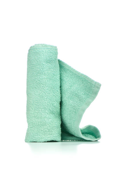 istock Light green terry towel isolated on white background. 1154826788
