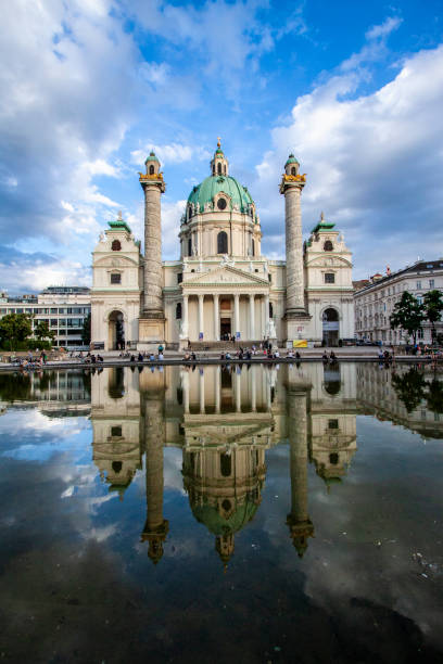 istock Reflection of karlskirche in Vienna 1154827720