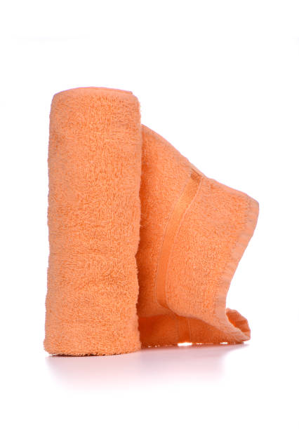 istock Orange terry towel isolated on white background. 1154828465