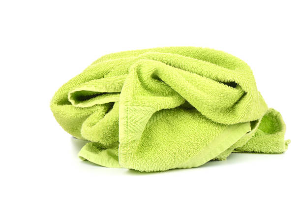 istock Green terry towel isolated on white background. 1154828523