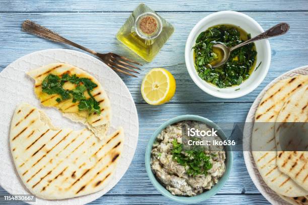 Pita Bread With Eggplant Dip Olive Oil And Herbs Mediterranean Cuisine Stock Photo - Download Image Now