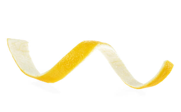 istock Lemon twist on white background, isolated lemon peel. 1154831837