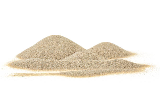 istock Pile of sand isolated on a white background 1154831878
