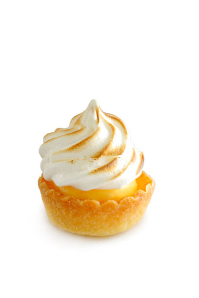 istock Mini lemon meringue tart isolated on white background 1154833591