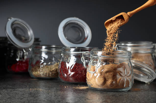 istock Various Oriental spices and herbs in glass jars. 1154835214