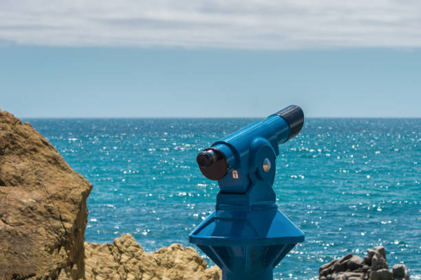 istock Blue telescope - panoramic binoculars for tourists with sea view 1154847163