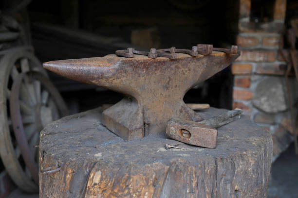 istock Anvil, horseshoe and hammer 1154850701