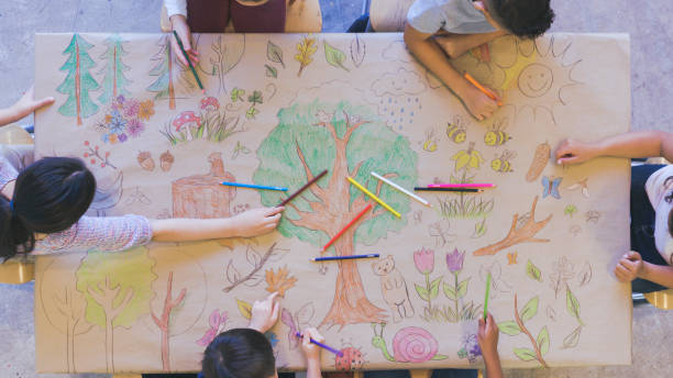 istock Kids draw mural celebrating nature 1154851593