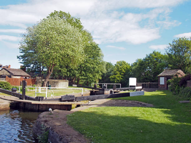 istock the exit lock gates at brighouse basin on the calder and hebble navigation canal with 19th century lock keepers building 1154854636