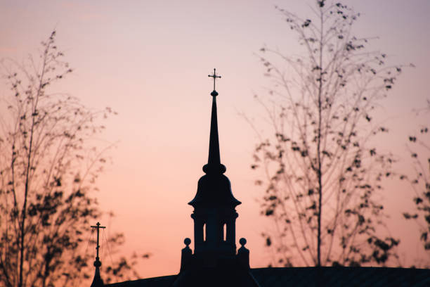 Silhouettes of the temple dome at sunset
