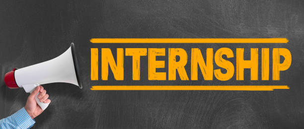 istock megaphone or bullhorn against blackboard with text INTERNSHIP 1154857291