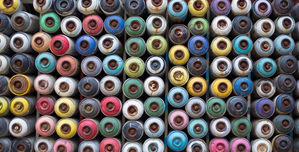 istock colorful paint cans lined up in a row 1154861588