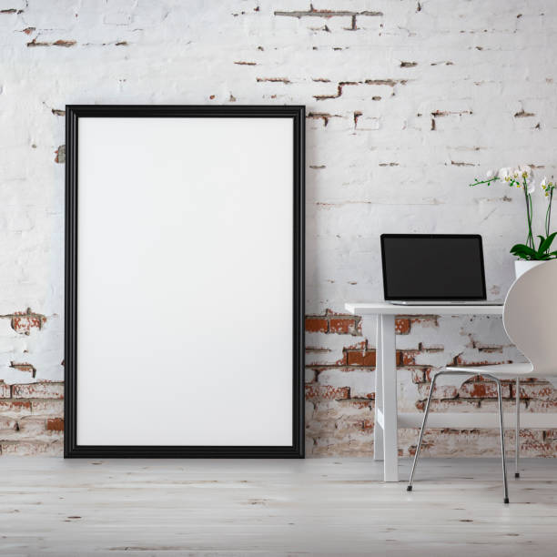 istock Workdesk with decoration, picture frame and copy space -ruined wall 1154863319