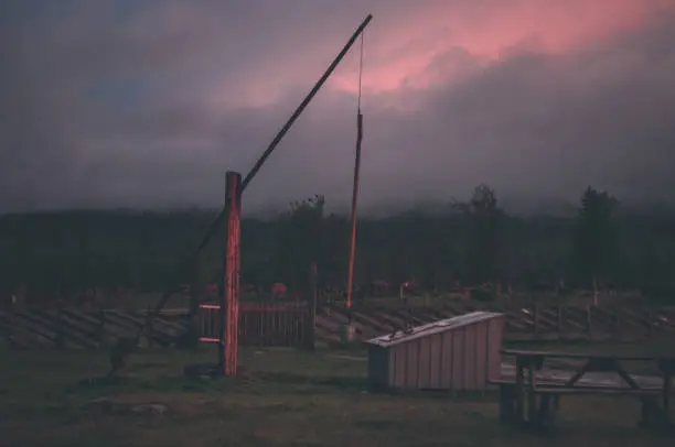 an old water well in a sunset