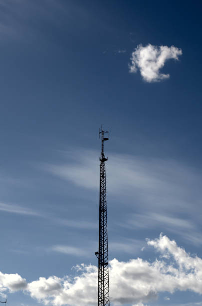 radio mast in front of blue sky - full moon audio imagens e fotografias de stock