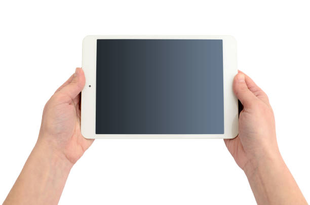 istock Hands holding a gadget on a white background. 1154865159