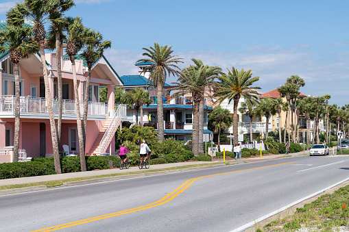 Destin, USA - April 24, 2018: Miramar beach city town village with colorful multicolored yellow beachfront houses in Florida panhandle gulf of mexico, coast highway road street