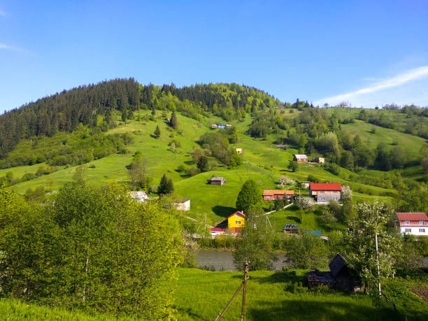 Village In the Carpathian Mountains Ukrainian village in mountains Landscape ukrainian village stock pictures, royalty-free photos & images