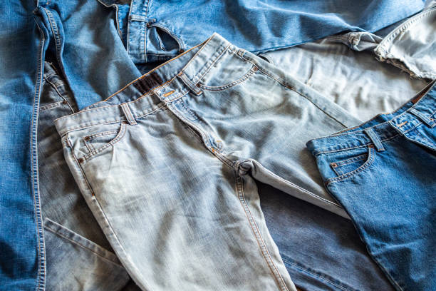 istock many denim blue jeans background 1154872653