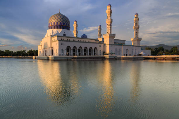 istock Beautiful Floating Mosque Of Kota Kinabalu, Sabah with reflection during twilight sunset. 1154873721