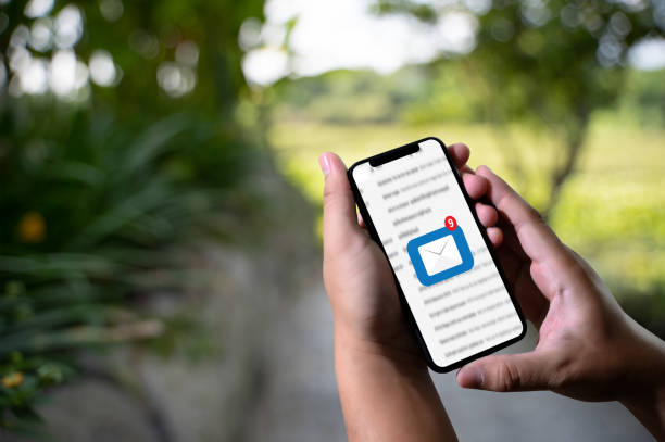 istock Mail Communication Connection message to mailing contacts phone Global Letters Concept 1154890388