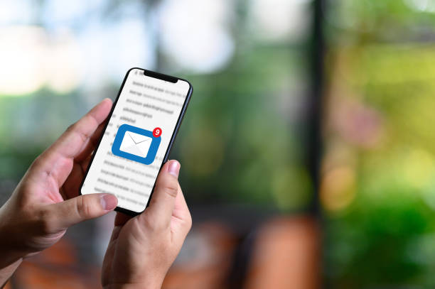 istock Mail Communication Connection message to mailing contacts phone Global Letters Concept 1154890391