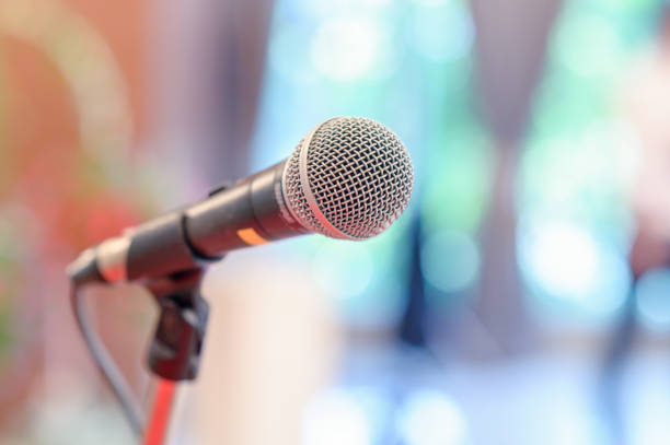 istock communication microphone on stage against a background of auditorium Concert stage 1154890536