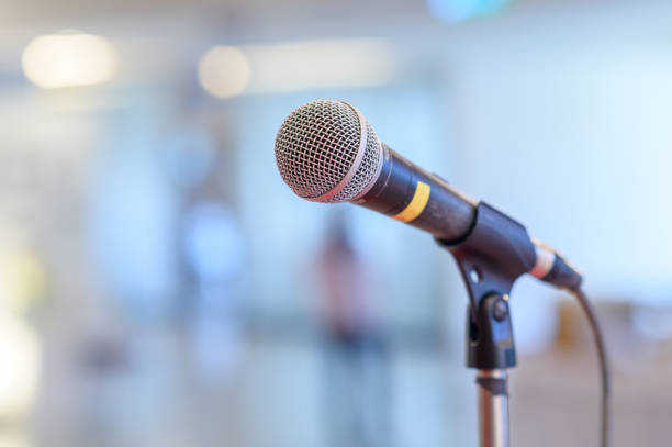istock communication microphone on stage against a background of auditorium Concert stage 1154890557