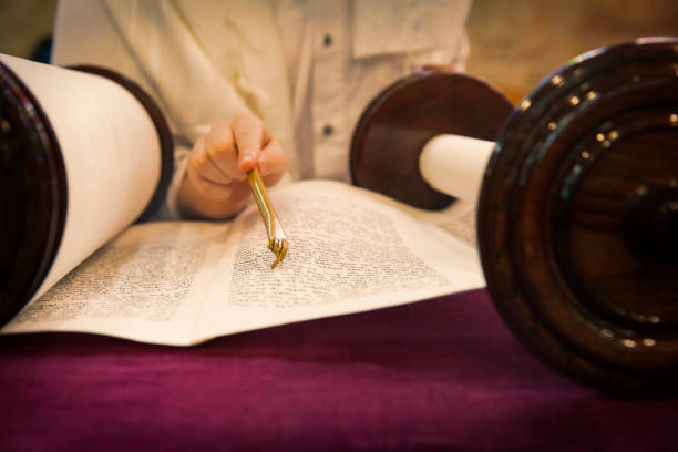 istock Bar Mitzvah boy reading from the Torah 1154892793
