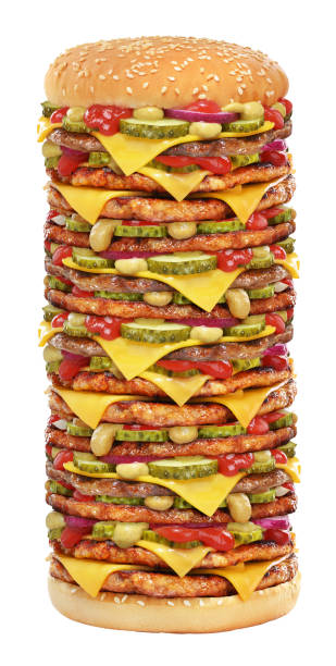 Very tall  cheeseburger isolated on white Very tall cheeseburger with beef patty, pickles, cheese, tomato ketchup, onion and mustard isolated on white background. biggest stock pictures, royalty-free photos & images